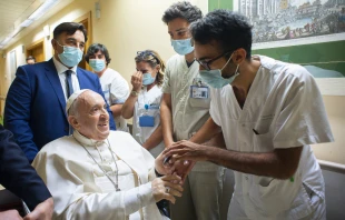 Pope Francis greets staff at the Gemelli Hospital in Rome, July 11, 2021. Vatican Media.